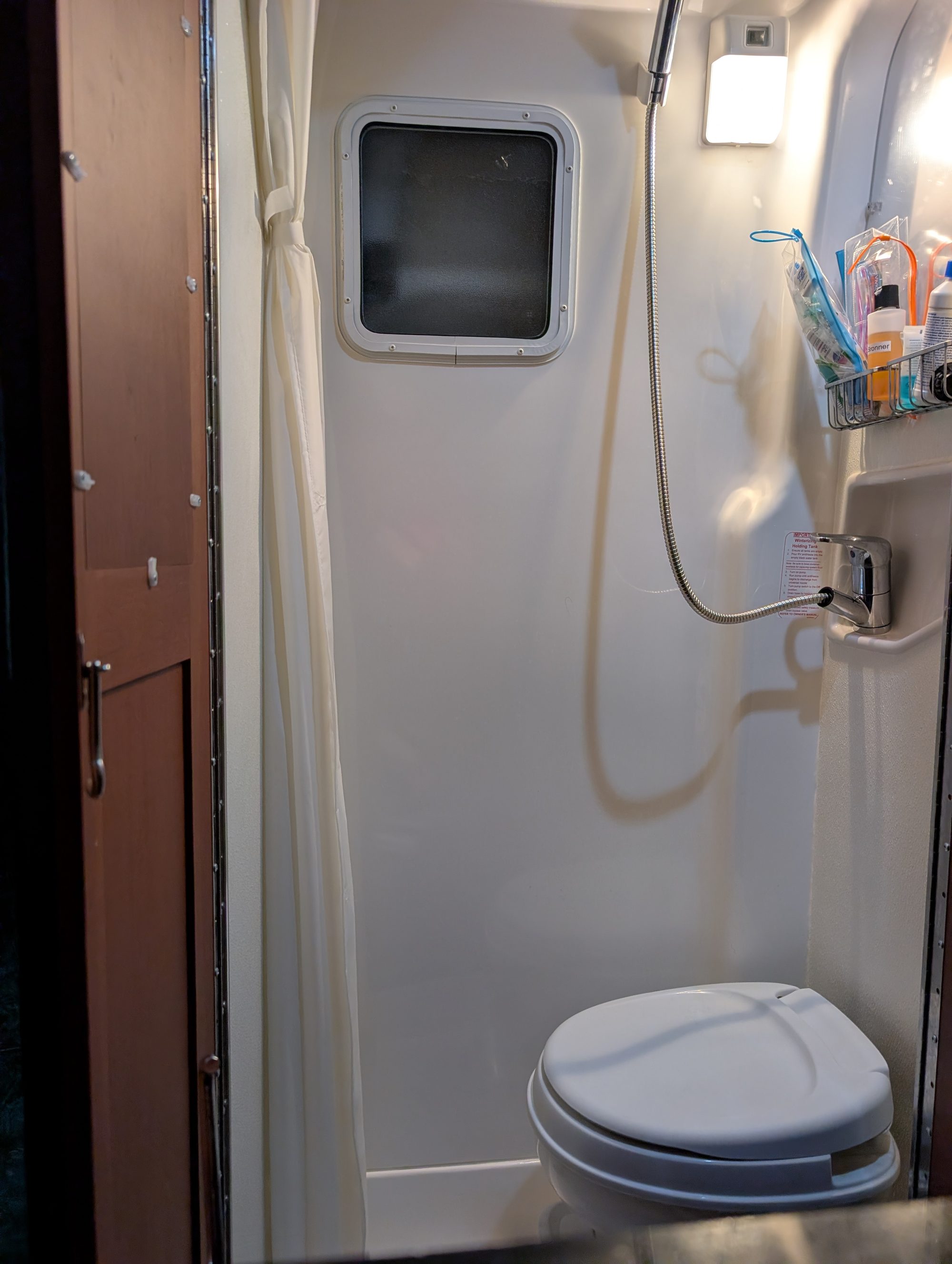 Wet bath with toilet and shower