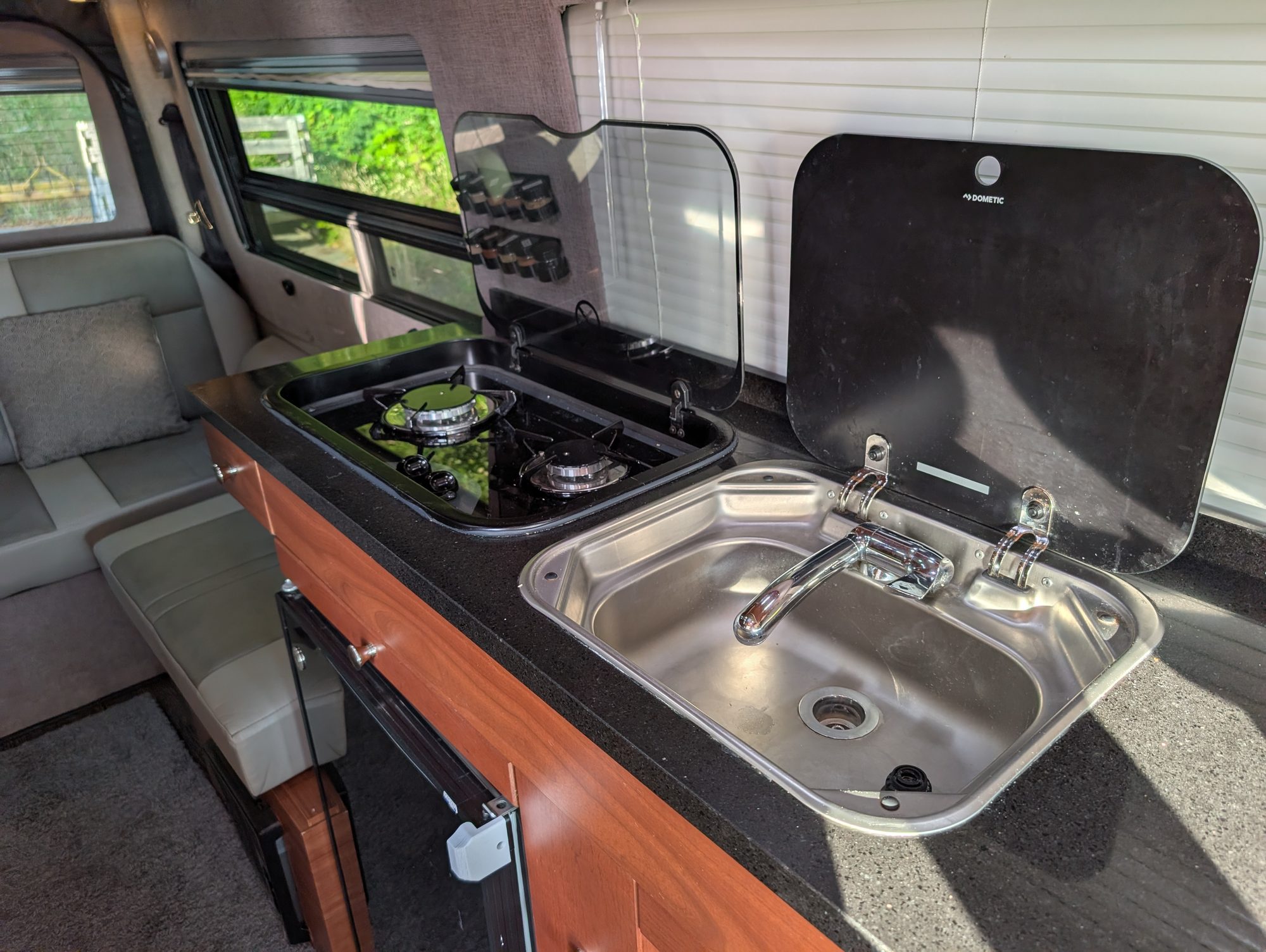 Galley with two-burner stove and Dometic sink cover